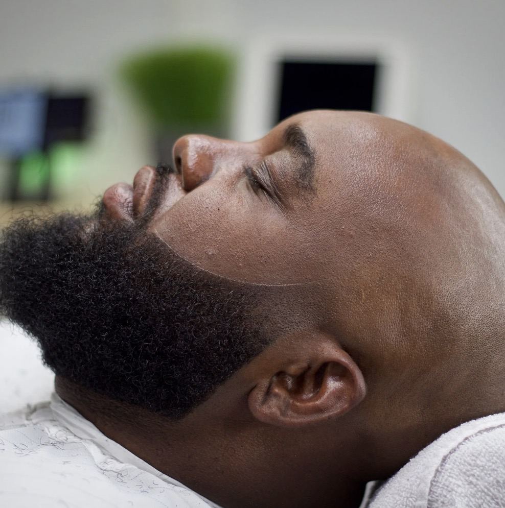 Natural beard lineup and bald head grooming by Premium Fade League