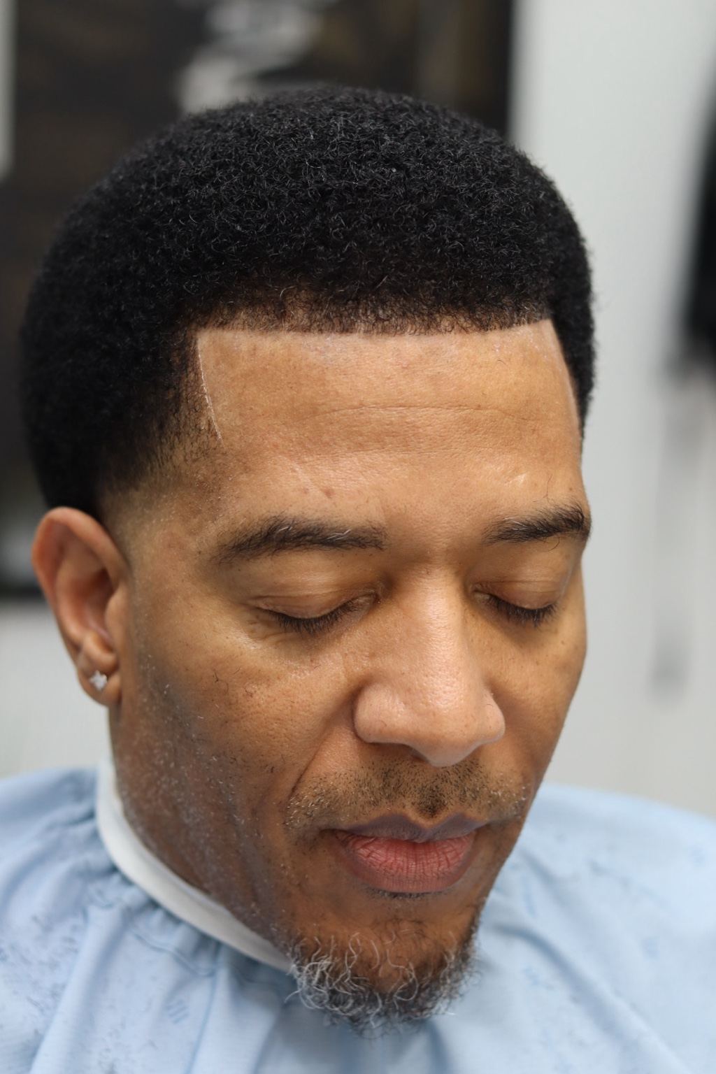 Natural textured haircut and lineup by Premium Fade League