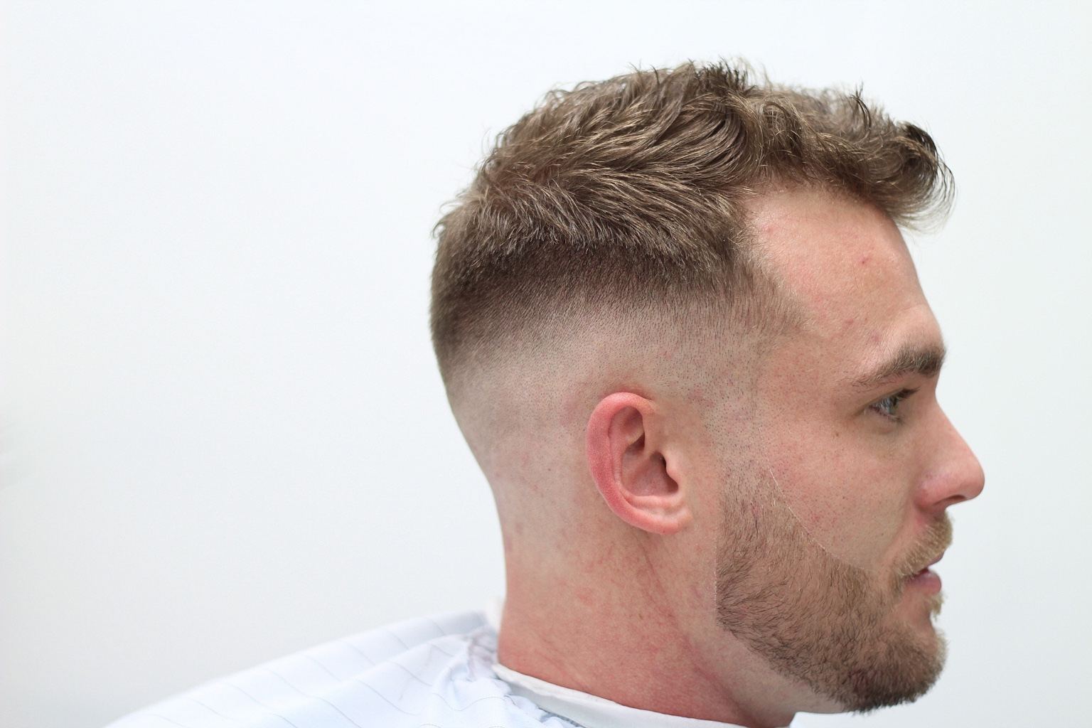 Straight hair fade and beard detail by Premium Fade League